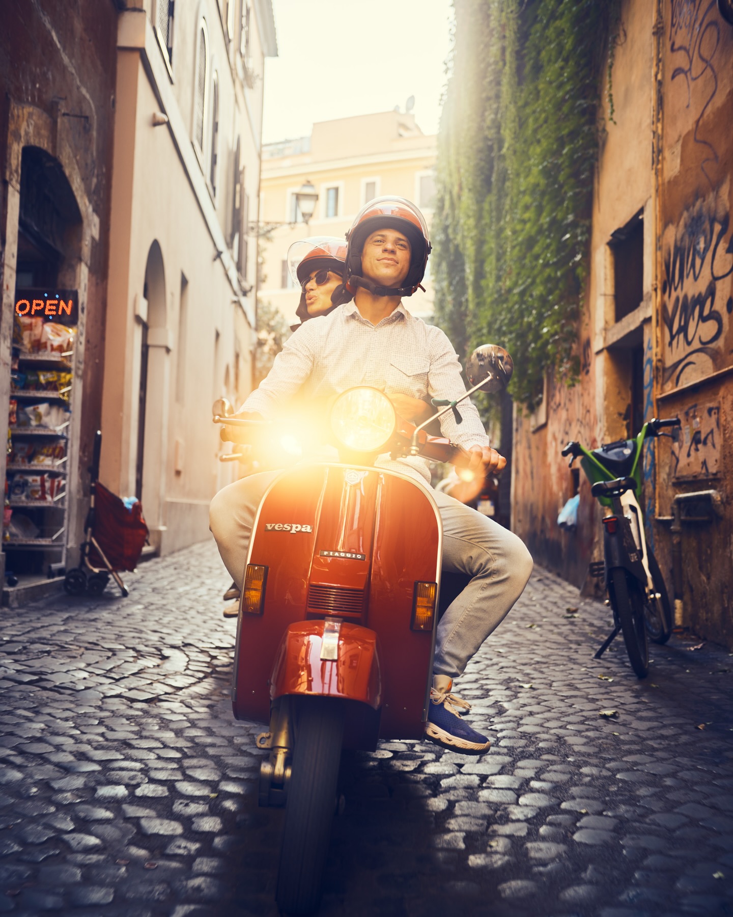 Rome Vespa Tour moment on a bright Roman street